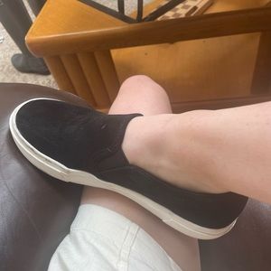 Black slip on sneakers